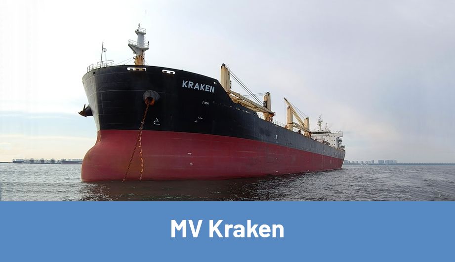 The Kraken Motor Vessel after leaving the harbor, with buildings far in the background