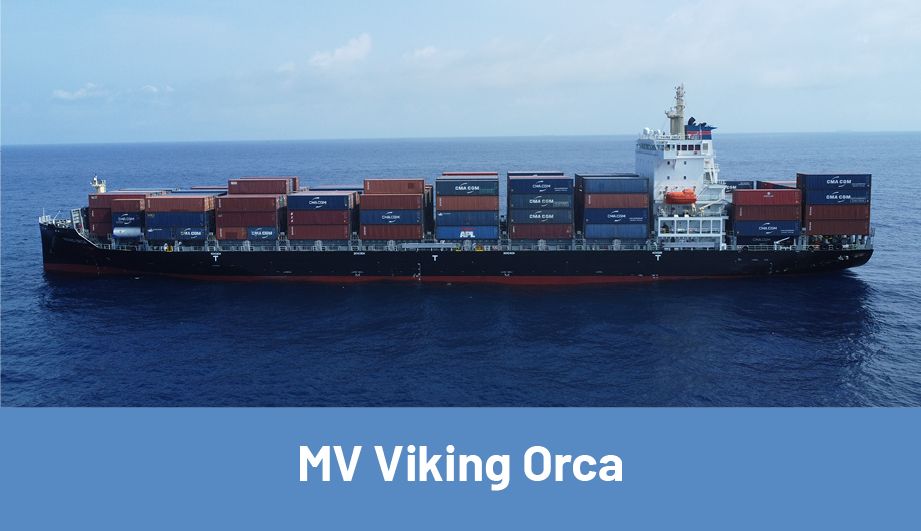 The Viking Orca Motor Vessel on the Blue Sea, loaded with many containers