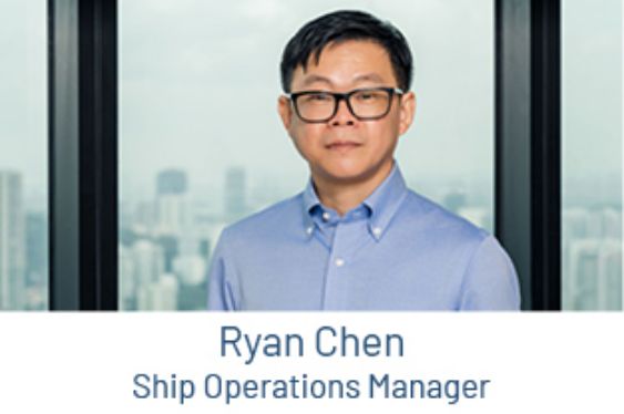 Portrait of Ryan Cheng, Ship Operations Manager, in front of a window