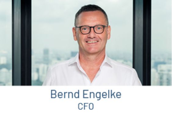 Portrait of Bernd Engelke, CFO, in front of a window