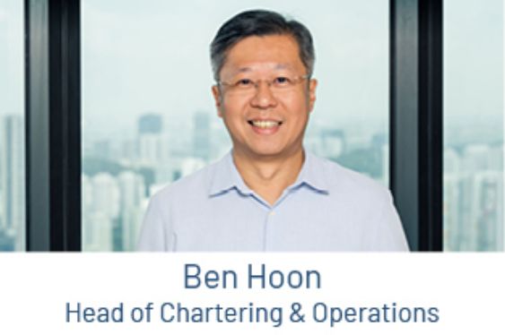 Portrait of Ben Hoon, Head of Chartering and Operations in front of a window