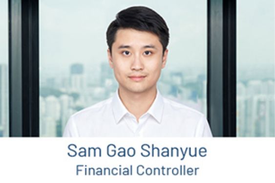 Portrait of Sam Gao Shanyue, Financial Controller, in front of a window